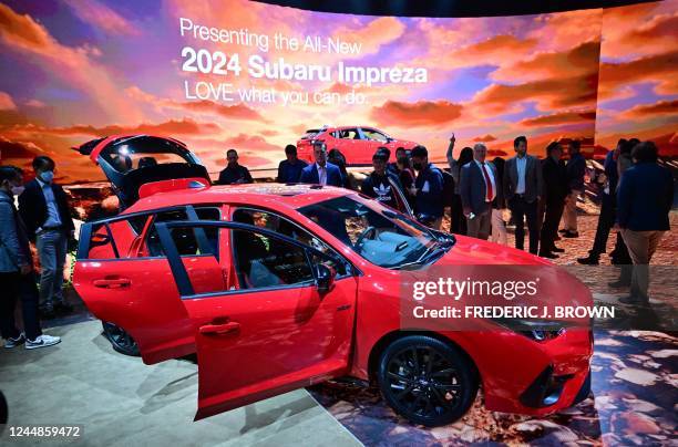 People view the new Subaru Impreza unveiled today at the Los Angeles Auto Show in Los Angeles, California on November 17, 2022.