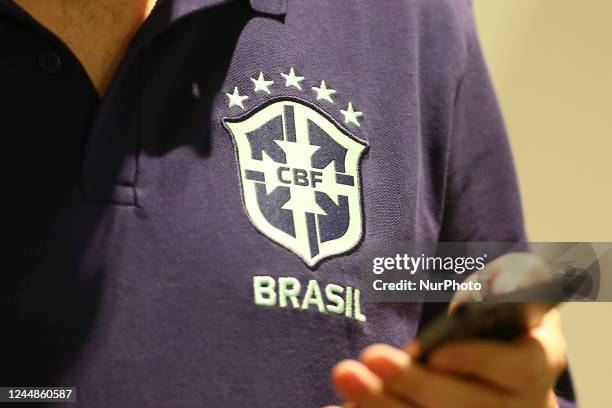 The symbol of the Brazil national team on the jersey of a staff man during the press conference held after the training of the Brazil national...