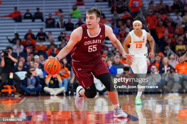 Colgate Raiders Forward Jeff Woodward dribbles the ball during the first half of the college basketball game between the Colgate Raiders and Syracuse...