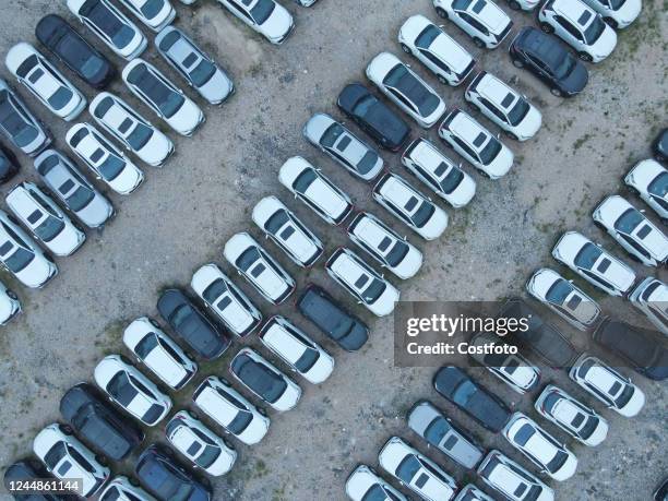 Aerial photo taken on Nov 16, 2022 shows cars for sale and various new energy vehicles at a parking lot in Nanning, South China's Guangxi Zhuang...