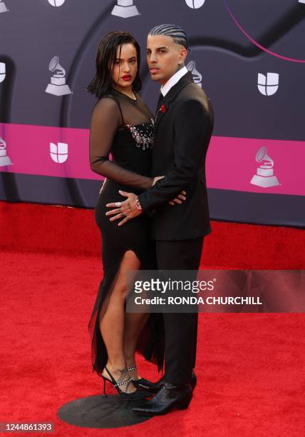 Puerto Rican singer Rauw Alejandro and Spanish singer Rosalia arrive for the 23rd Annual Latin Grammy awards at the Mandalay Bay's Michelob Ultra...
