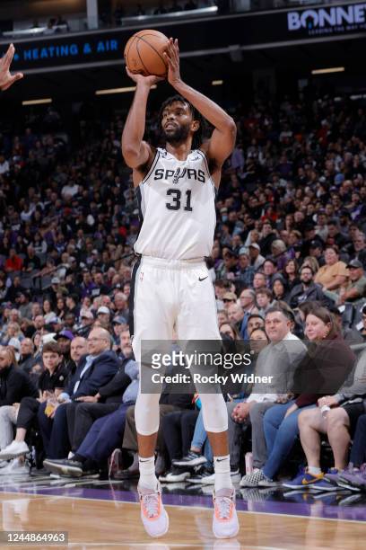 Keita Bates-Diop of the San Antonio Spurs shoots a three point basket during the game against the Sacramento Kings on November 17, 2022 at Golden 1...