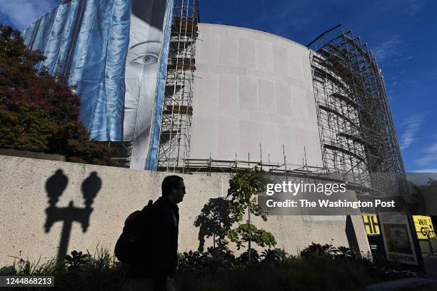 Scaffolding begins to be taken down outside the Hirshhorn Museum and Sculpture Garden on Wednesday November 16, 2022 in Washington, DC. A...