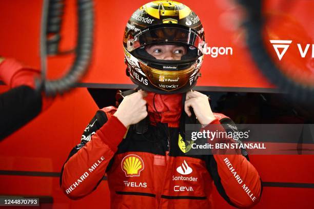 Ferrari's Israeli driver Robert Shwartzman is pictured in the pits during the first practice session ahead of the Abu Dhabi Formula One Grand Prix at...