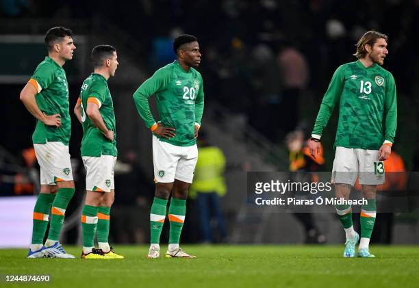 Dublin , Ireland - 17 November 2022; Republic of Ireland players, from left, John Egan, Josh Cullen, Chiedozie Ogbene and Jeff Hendrick after their...