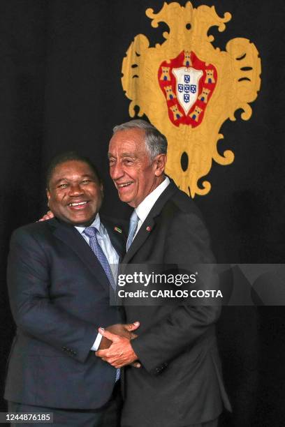 Portuguese President Marcelo Rebelo de Sousa welcomes his Mozambican counterpart Filipe Nyusi at the Belem Palace in Lisbon on November 18, 2022.