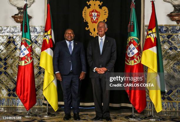 Portuguese President Marcelo Rebelo de Sousa welcomes his Mozambican counterpart Filipe Nyusi at the Belem Palace in Lisbon on November 18, 2022.