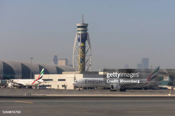 Passenger aircraft, operated by Emirates Airlines, on the tarmac at Al Maktoum International Airport in Dubai, United Arab Emirates, on Friday, Nov....