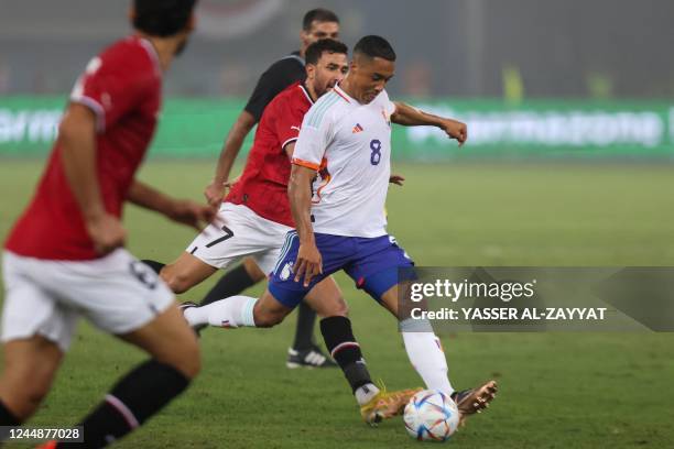 Egypt's players mark Belgium's midfielder Youri Tielemans during the friendly football match between Belgium and Egypt at the Jaber Al-Ahmad Stadium...