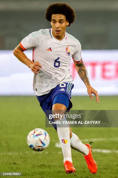 Belgium's midfielder Axel Witsel runs with the ball during the friendly football match between Belgium and Egypt at the Jaber Al-Ahmad Stadium in...