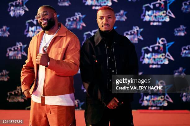 French rap singer and music composer Said M'Roumbaba aka Soprano and French rapper Wanani Gradi Mariadi aka Gradur pose before attending the 24th...