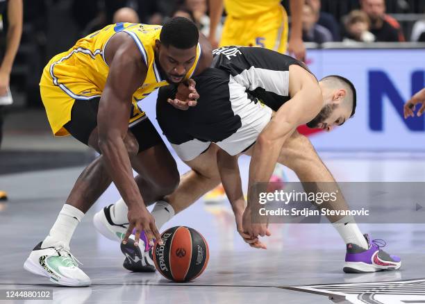 Alex Poythress of Maccabi in action against Ioannis Papapetrou of Partizan in action during the 2022/2023 Turkish Airlines EuroLeague Regular Season...