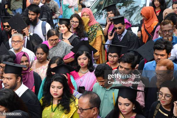 Group of graduates gather to expressing their delight of the Curzon hall at university area, on the 53th convocation of the students of Dhaka...