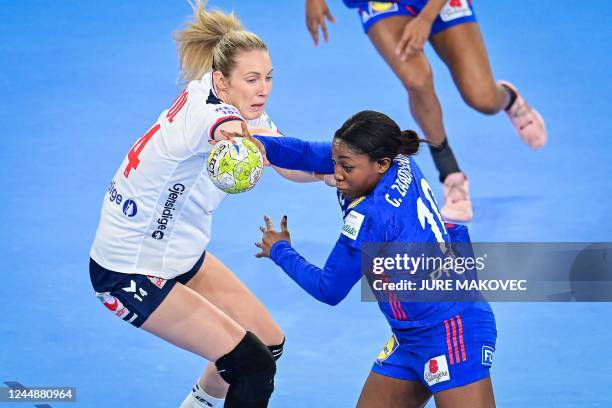 France's centre back Grace Zaadi Deuna vies with Norways left back Kristine Breistol during the EHF Womens European Championship semi-final handball...