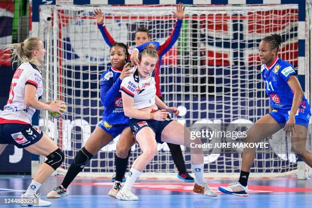 Frances Pauletta Foppa fights for the ball with Norways Vilde Mortensen Ingstad during the EHF Womens European Championship semi-final handball match...