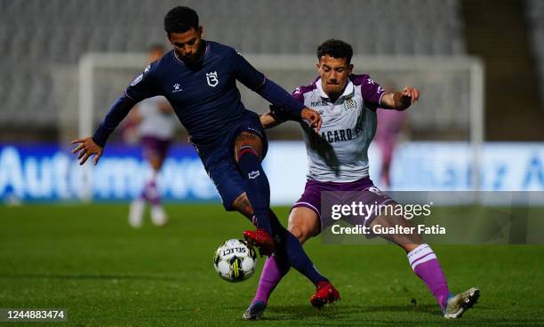 Henrique Custodio of Belenenses SAD with Berna Conceicao of Boavista FC in action during the Allianz Cup match between Belenenses SAD and Boavista FC...