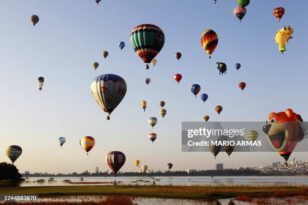 View of hot-air balloons during the XX International Balloon Festival in Leon, Guanajuato state, Mexico, taken on November 18, 2022. - About 200...