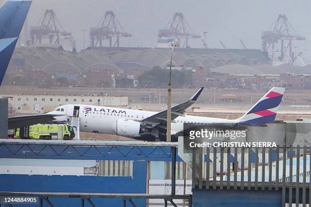 This grab from an AFP video shows the LA2213 flight plane after it collided with a firefighting vehicle at the Jorge Chavez International Ariport in...