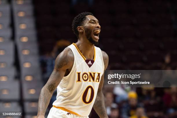 Iona Gaels guard Berrick JeanLouis reacts after scoring during a Basketball Hall of Fame Showcase college basketball game between the Iona Gaels and...