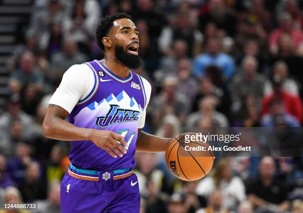 Mike Conley of the Utah Jazz in action during a game against the Phoenix Suns at Vivint Arena on November 18, 2022 in Salt Lake City, Utah. NOTE TO...