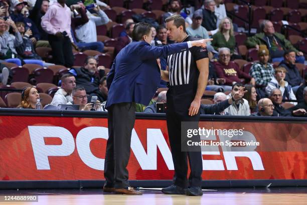 Iona Gaels head coach Rick Pitino complains to referee Nathan Farrell during the college basket Hall of Fame Showcase game between Iona Gaels and...