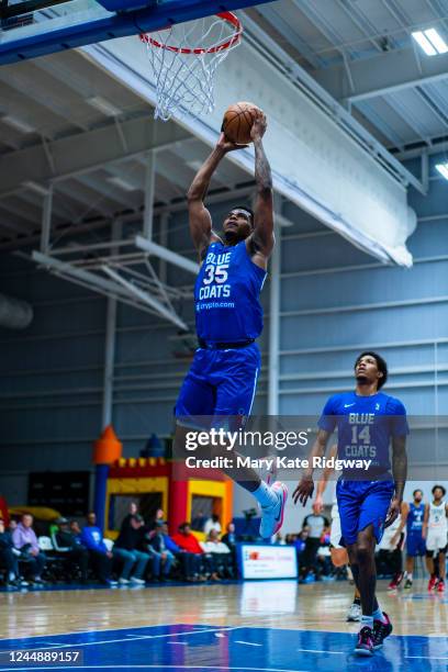 Michael Foster Jr. #35 of the Delaware Blue Coats dunks the ball against the Raptors 905 on November 18, 2022 at Chase Fieldhouse in Wilmington,...