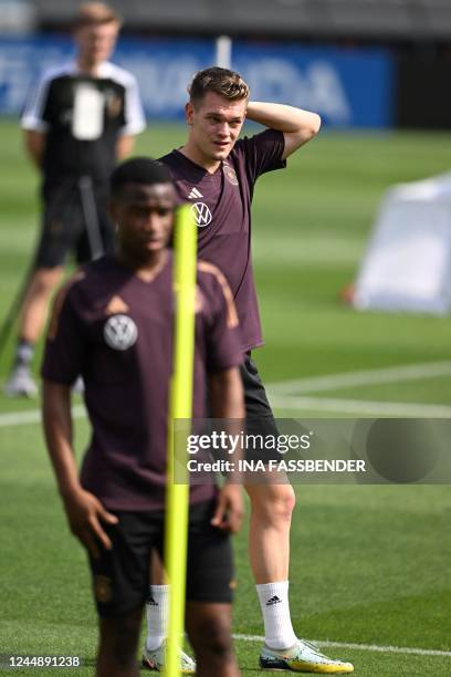 Germany's defender Matthias Ginter takes part in a training session at Al Shamal Stadium in Al Shamal, north of Doha on November 19 ahead of the...