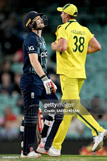 England's James Vince reacts after his dismissal during the second one-day international cricket match between Australia and England at the Sydney...