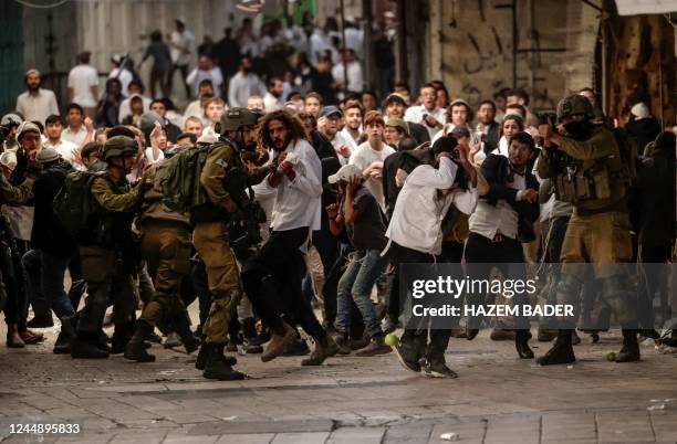 Israeli security forces deploy amid altercations between Jewish settlers on their way to visit the tomb of Othniel ben Kenaz in the area H1 and...