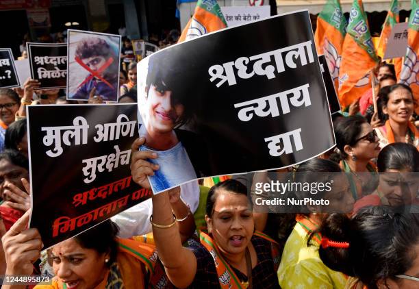 Women activist shout slogans, carry banners and burn a poster of Aftab Ameen Poonawala, demanding his death sentence for Shraddha Walkar murder case,...