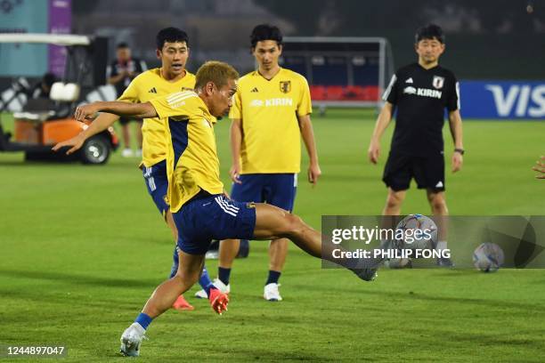 Japan's defender Yuto Nagatomo takes part in a training session at the Al Sadd SC training grounds in Doha on November 19 ahead of the Qatar 2022...