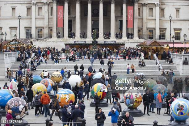 Large spherical sculptures are on display as part of the open-air exhibition "The World Reimagined" in Trafalgar Square, on November 19, 2022 in...