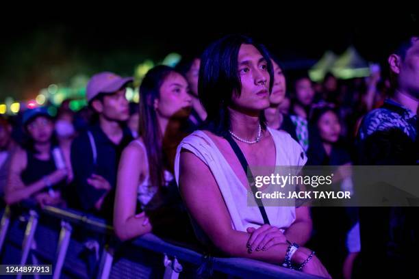 Revellers watch a performance at Maho Rasop music festival in Bangkok on November 19, 2022.