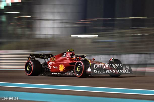 Ferrari's Spanish driver Carlos Sainz Jr drives during the qualifying session on the eve of the Abu Dhabi Formula One Grand Prix at the Yas Marina...