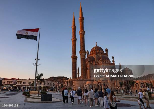 An Egyptian flag flies outside the Grand Mosque of al-Sahaba during the COP27 climate conference in Egypt's Red Sea resort city of Sharm el-Sheikh on...