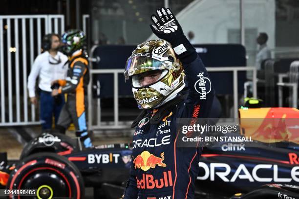 Red Bull's Dutch driver Max Verstappen waves to the crows after the qualifying session on the eve of the Abu Dhabi Formula One Grand Prix at the Yas...