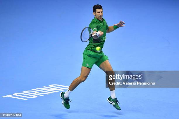 Novak Djokovic of Serbia plays a forehand shot during the semi final match between Taylor Fritz of United States during day seven of the Nitto ATP...