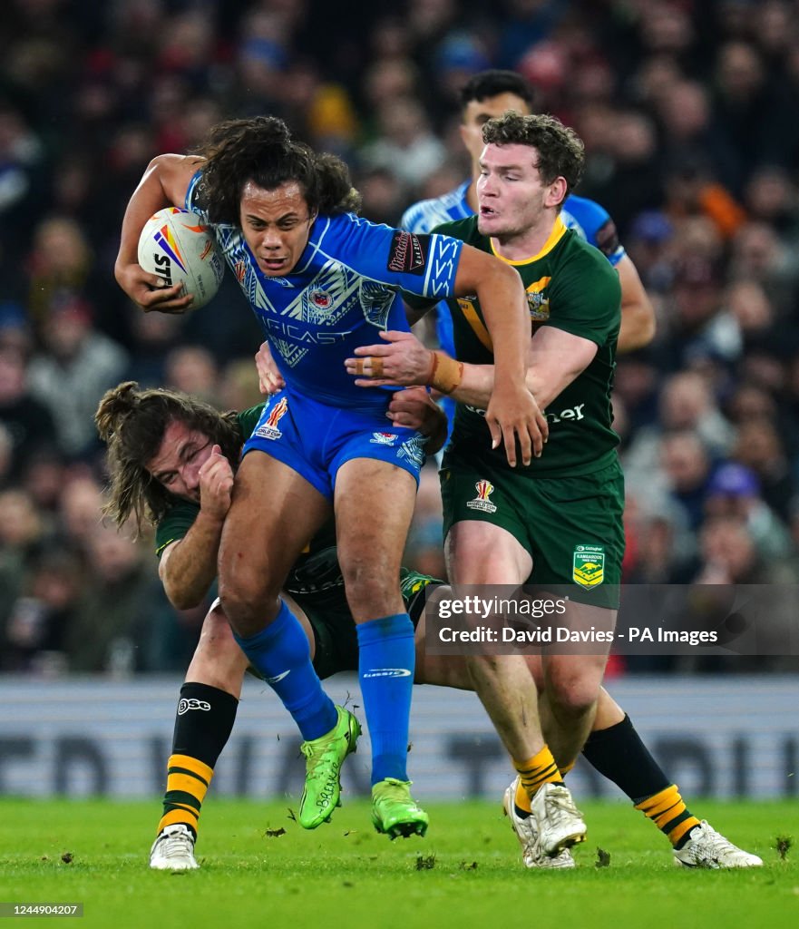 Zeek Patrick Rugby Samoa's Jarome Luai tackled by Australia's Patrick Carrigan and Liam ...