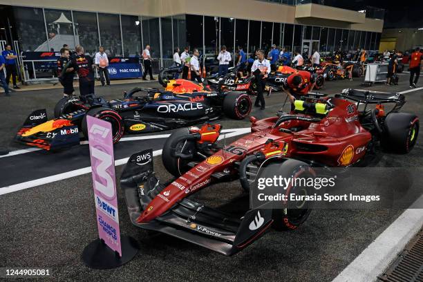 Max Verstappen of Netherlands Oracle Red Bull Racing RB18 and 3rd place Charles Leclerc of Monaco, Team Ferrari F1-75 during qualifying ahead of the...