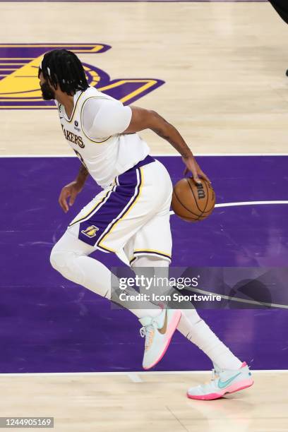 Los Angeles Lakers forward Anthony Davis dribbles behind his back during the NBA game between the Cleveland Cavilers and the Los Angeles Lakers on...