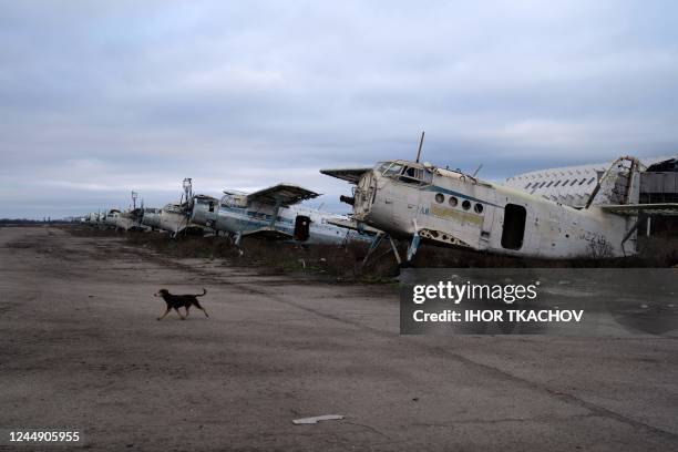 This photograph taken on November 19 shows damaged planes at the International Airport of Kherson in the village of Chornobaivka, outskirts of...