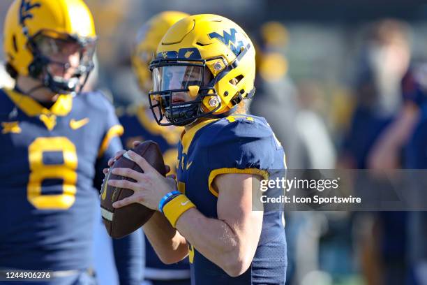 West Virginia Mountaineers quarterback Garrett Greene warms up prior to the college football game between the Kansas State Wildcats and the West...