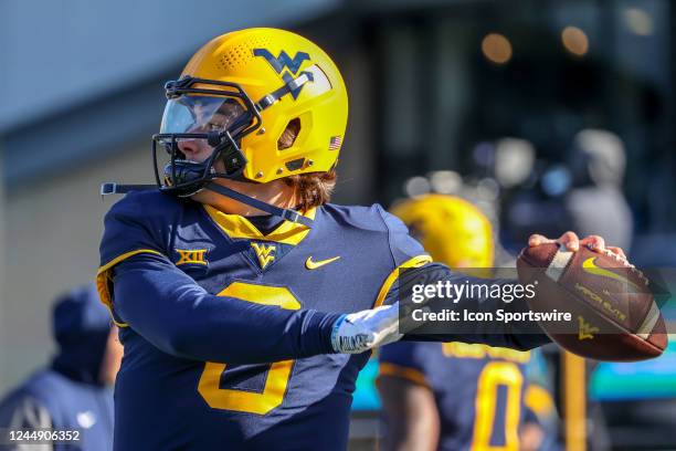 West Virginia Mountaineers quarterback Nicco Marchiol warms up prior to the college football game between the Kansas State Wildcats and the West...