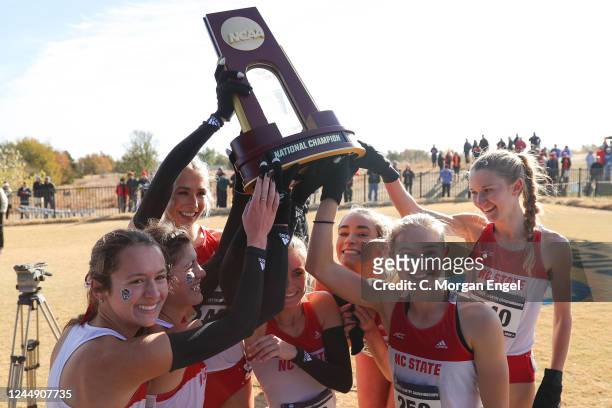 The NC State Wolfpack celebrate after winning the Division I Womens Cross Country Championship on November 19, 2022 in Stillwater, Oklahoma.