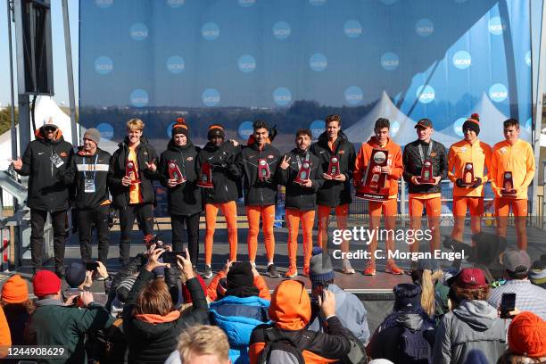 The Oklahoma State Cowboys celebrate their second place finish after the Division I Mens Cross Country Championship on November 19, 2022 in...