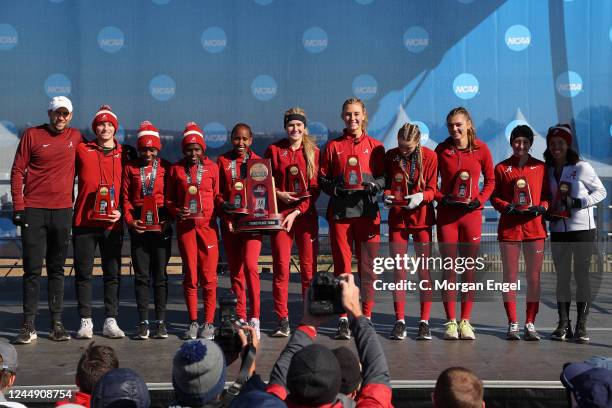 The Alabama Crimson Tide celebrate their third place finish after the Division I Womens Cross Country Championship on November 19, 2022 in...