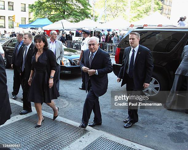 Dominique Strauss-Kahn and Anne Sinclair arrive at Manhattan Criminal Court to attend a status hearing on the sexual assault charges against...