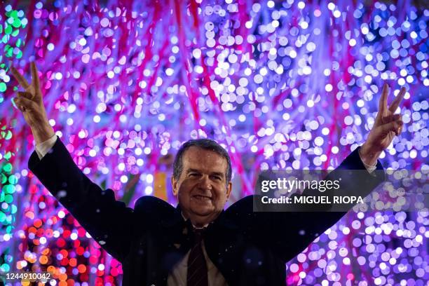 Mayor of Vigo Abel Caballero gestures after pressing the button to light the Christmas decorations at the Porta do Sol square in Vigo, northwestern...