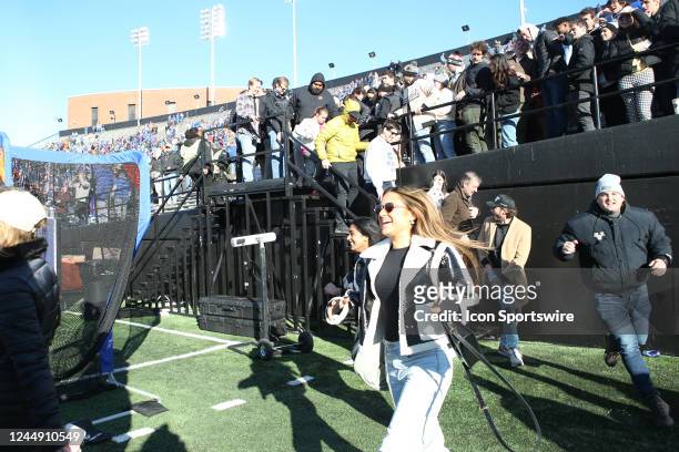 Vanderbilt Commodores fans rush down a staircase to storm the field following a 31-24 win over the Florida Gators, November 19, 2022 at FirstBank...