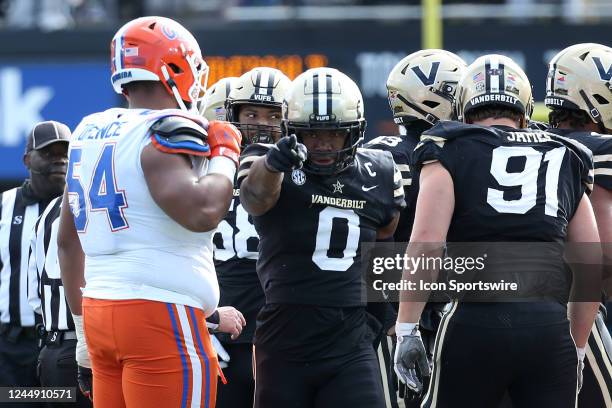 Vanderbilt Commodores linebacker Anfernee Orji points to Florida Gators offensive lineman O'Cyrus Torrence after making a tackle during a game...